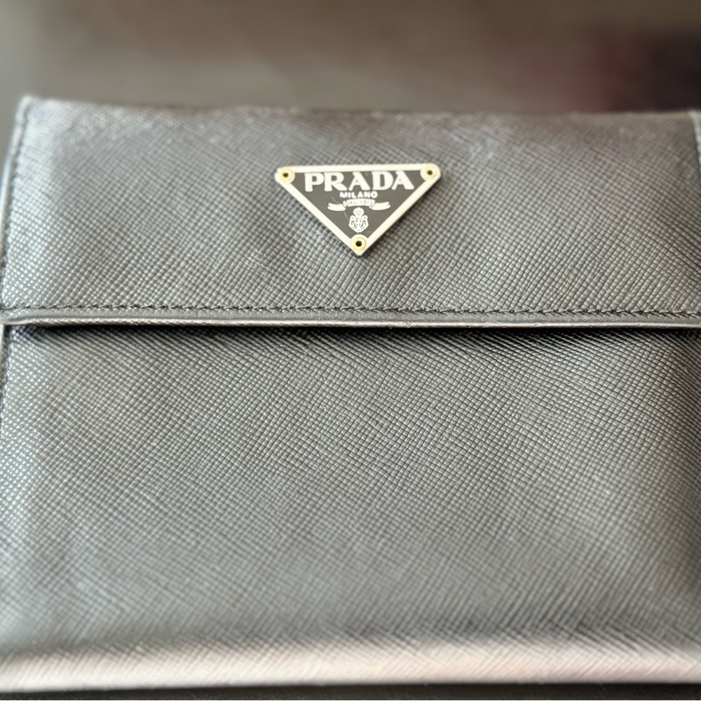 AUTHENTIC Prada Trifold wallet in black come
with card